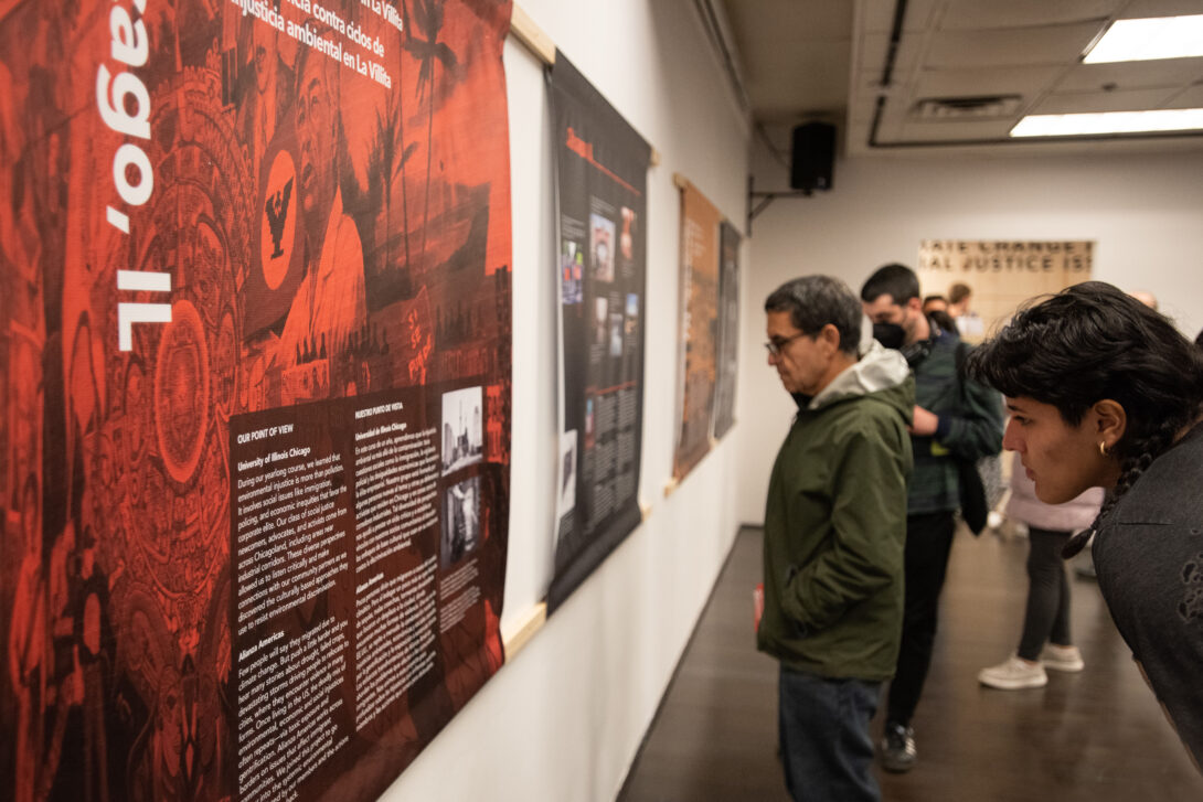 Visitors examine displays at The Chicago Justice Gallery, photo courtesy Matthew Lang